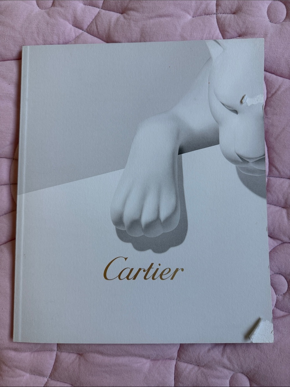 Cartier White and Light Gray Cat Cover Booklet with Gold Logo
